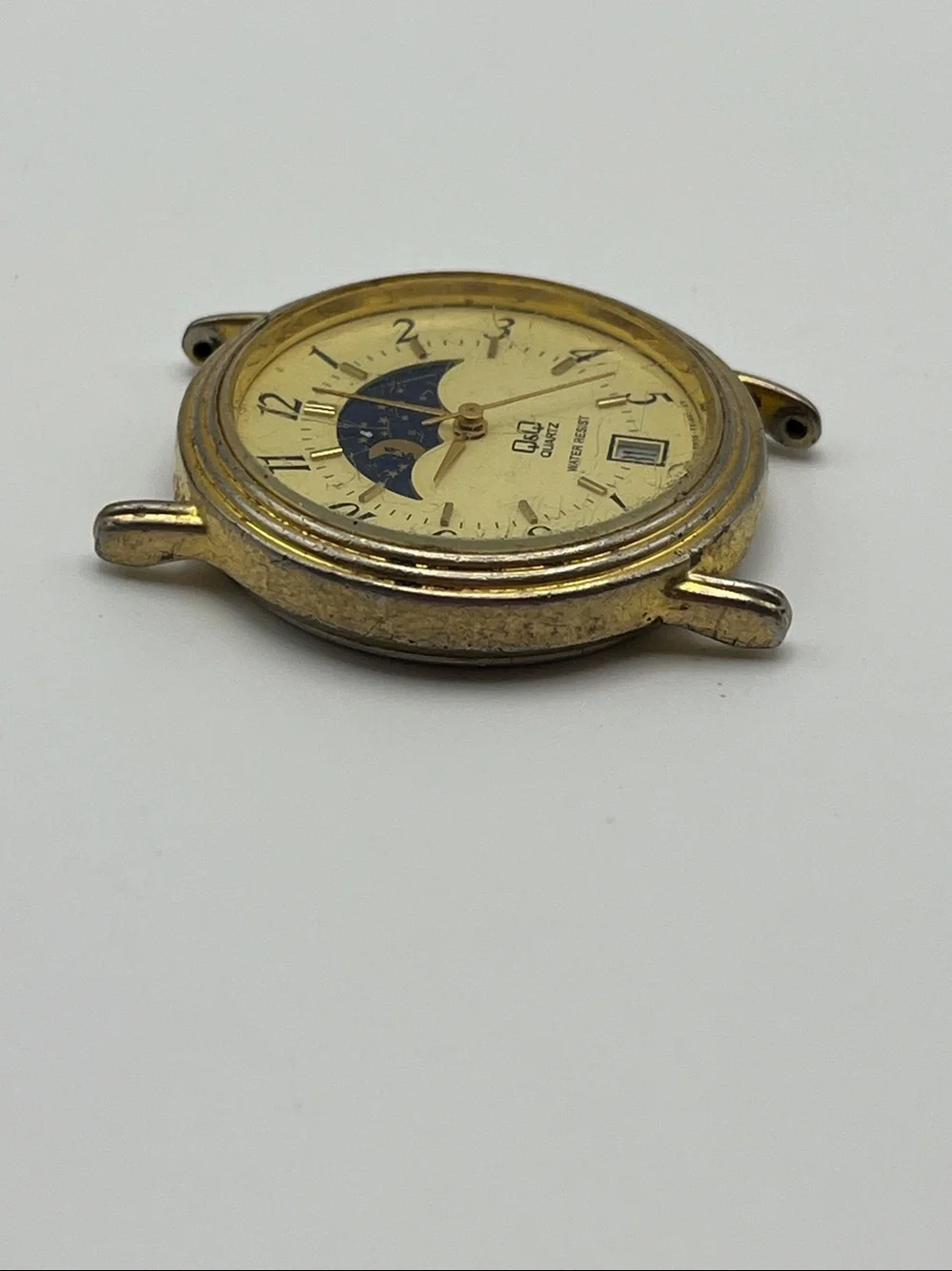 Q&Q Quartz Gold Tone Moonphase Dial Watch Face - Blue & Cream